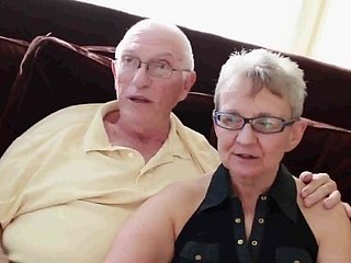 Grandma and grandpa encircling chum
