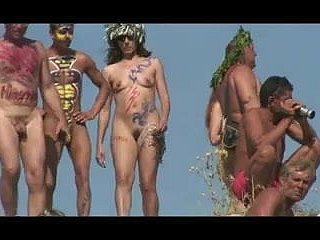 Girls with painted bodies in Russian nudist seaside